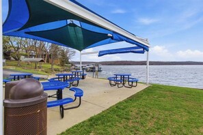 Outdoor dining - Bright Lakefront Condo, Amazing Views, Pools, Hot Tub (Osage Beach)