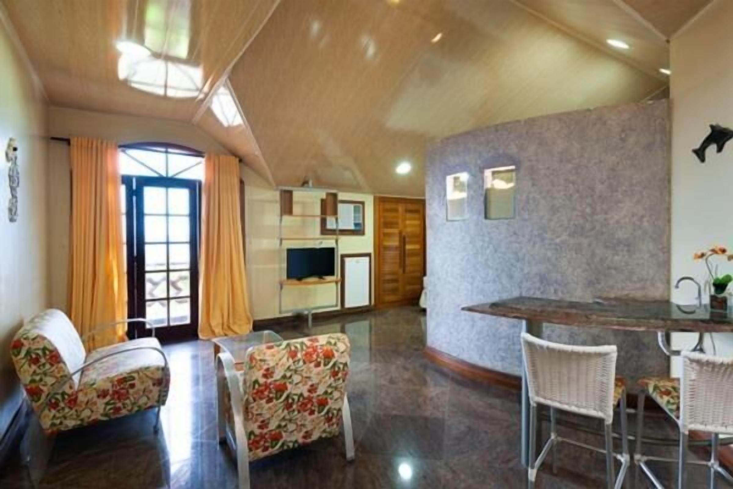 Loft família, sacada, vista para o mar | Parte interna