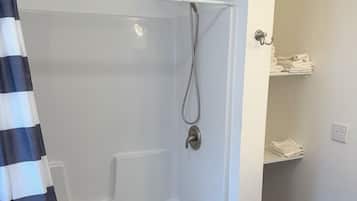 Hair dryer, towels, soap, toilet paper