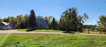 Highland Heights Farmhouse. On the beautiful prairie in rural Lisbon, 17+ acres!