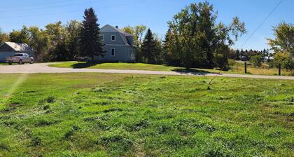 Highland Heights Farmhouse. On the beautiful prairie in rural Lisbon, 17+ acres!