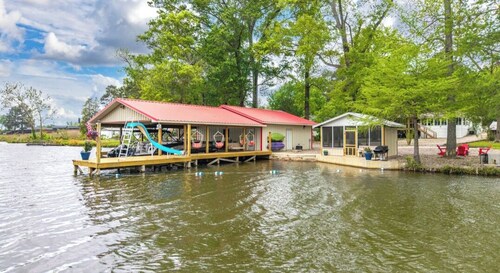 Waterfront, w/covered boat slip, screened gazebo, kayaks, slide w/swim area