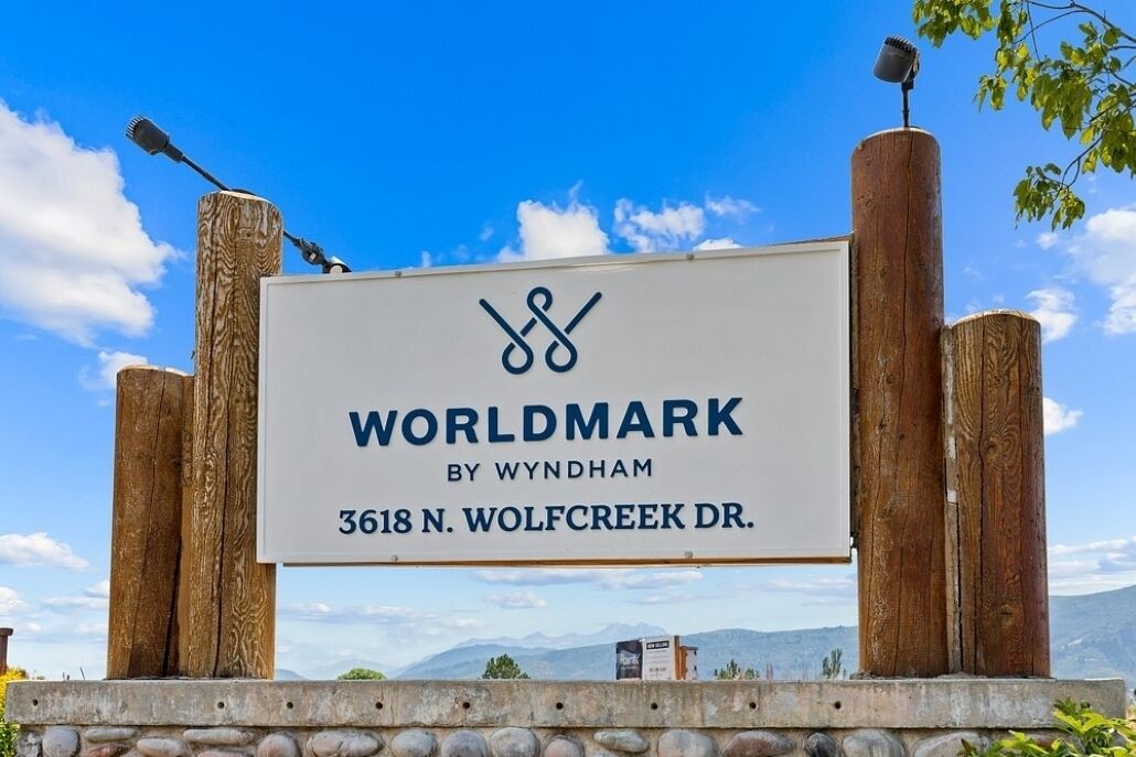 A sign for 'WORLDMARK BY WYNDHAM' at 3618 N. WOLF CREEK DR.