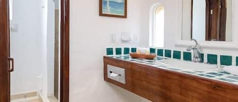 Hair dryer, towels, soap, shampoo