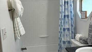 Hair dryer, towels, soap, shampoo