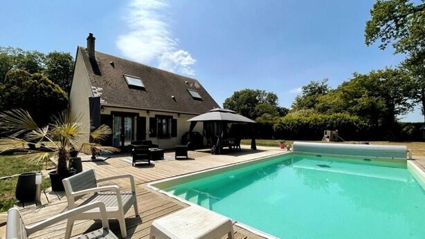 A swimming pool with a wooden deck, lounge chairs, and a gazebo. - BoiKlo - Heated pool/Billard/Nordic spa 10p (Mesnils-sur-Iton)