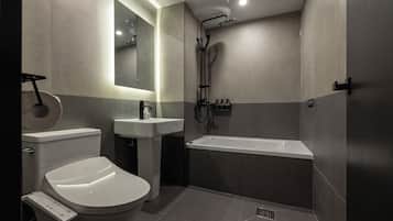 Separate bathtub and shower, hair dryer, slippers, towels