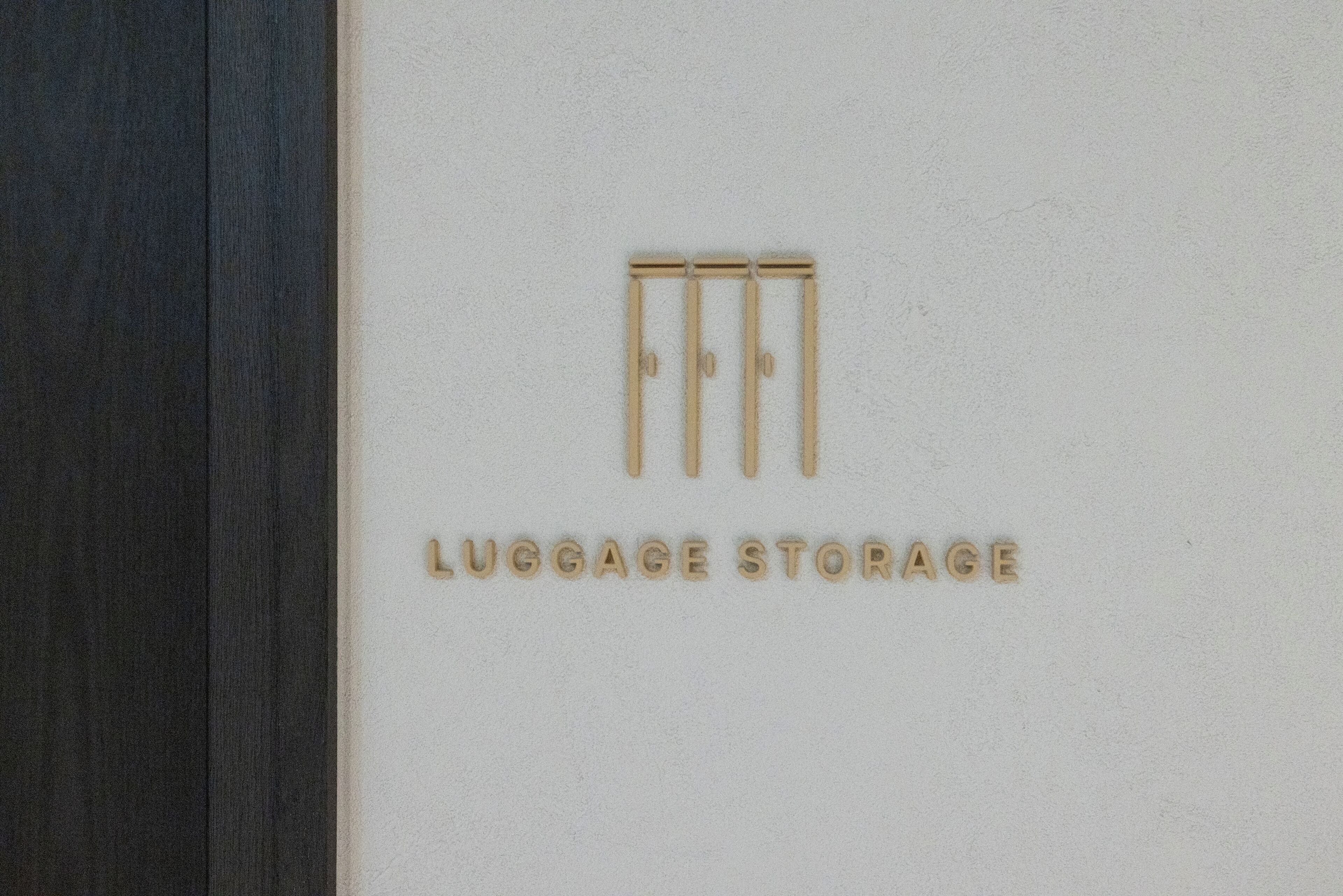 A logo with the text 'LUGGAGE STORAGE' on a white background.