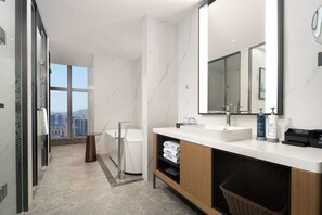 Business Suite, City View | Bathroom | Rainfall showerhead, free toiletries, hair dryer, slippers