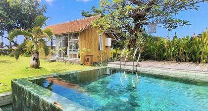 Rumah Putih – Great Value Beachfront 1BR with Pool & Garden