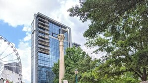 A park with a monument, a Ferris wheel, and a modern building in the background. - Club Wyndham Atlanta, Jun 14–25, 2026, FIFA World Cup, 1 Bedroom Unit (Atlanta)