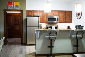 Condo, Multiple Beds, Jetted Tub, Mountain View (2 Br: Soaring Eagle 216) | Private kitchen - Soaring Eagle # 216 2 Bedrooms, 2 Full Baths:slopeside, Hot Tubs, Underground Parking (Snowshoe)