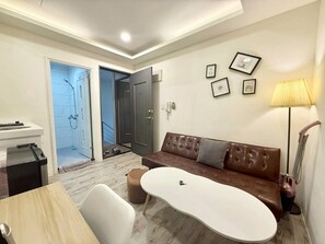 Deluxe-Doppelzimmer | Wohnbereich