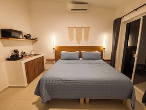 Apartment, 1 King Bed, Kitchen, Garden View | Free minibar, blackout drapes, iron/ironing board, free WiFi - Tayga studios Cancun (Cancun)
