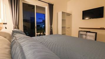 Apartment, 1 King Bed, Kitchen, Garden View | Free minibar, blackout drapes, iron/ironing board, free WiFi