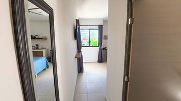 Apartment, 1 King Bed, Kitchen, Garden View | Free minibar, blackout curtains, iron/ironing board, free WiFi