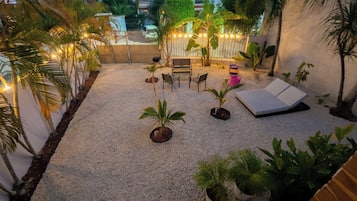 Apartment, 1 King Bed, Kitchen, Garden View | Terrace/patio
