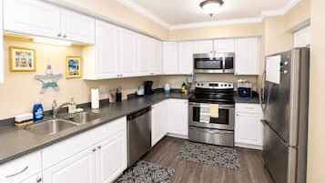 Coffee/tea maker, fridge, microwave, oven