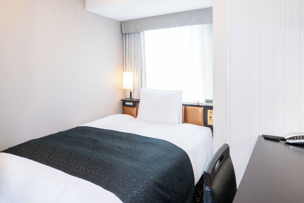 ห้องสแตนดาร์ดซิงเกิล, ปลอดบุหรี่ (for 1 Adult) | ผ้านวมขนเป็ด, โต๊ะทำงาน, พื้นที่ทำงานแบบใช้แล็ปท็อป, ผ้าม่านกันแสง