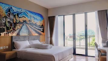 Doppia Deluxe, 1 letto king, balcone, vista montagna | Una cassaforte in camera, Wi-Fi gratuito