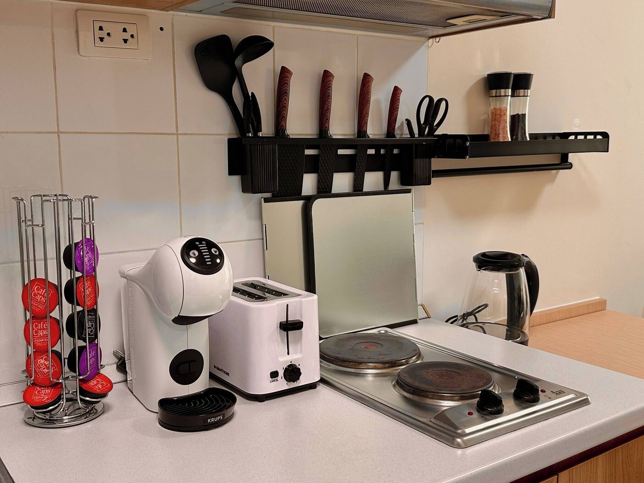 Fridge, microwave, stovetop, coffee/tea maker