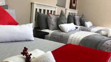 Family Room | Blackout curtains, iron/ironing board, free WiFi