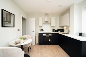 Fridge, microwave, electric kettle, toaster - Church House by Guestz (Filton)