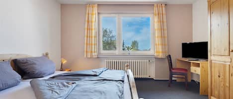 1 habitación y ropa de cama