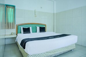 Bedroom - Cozy Single Stay with Free WiFi and Parking (Palembang)