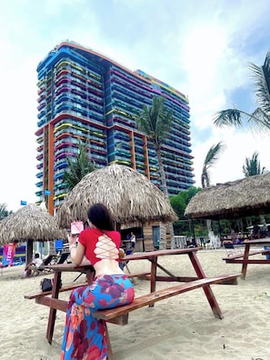 Private beach, white sand, sun loungers, beach umbrellas