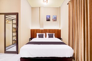 Unclassified image, 3 of 15, button - Cozy Double Escape W/ Free WiFi and Parking (Padang)