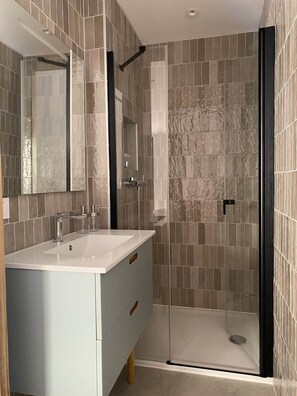 Shower, eco-friendly toiletries, hair dryer, soap