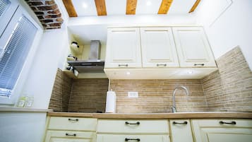 Estúdio (A1) | Cozinha privada | Geladeira, cooktop, máquina de café expresso, chaleira elétrica
