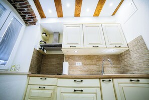 Estúdio (A1) | Cozinha privada | Geladeira, cooktop, máquina de café expresso, chaleira elétrica