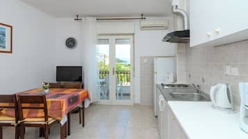 Apartment (A1) | Private kitchen | Fridge, stovetop, espresso maker, electric kettle