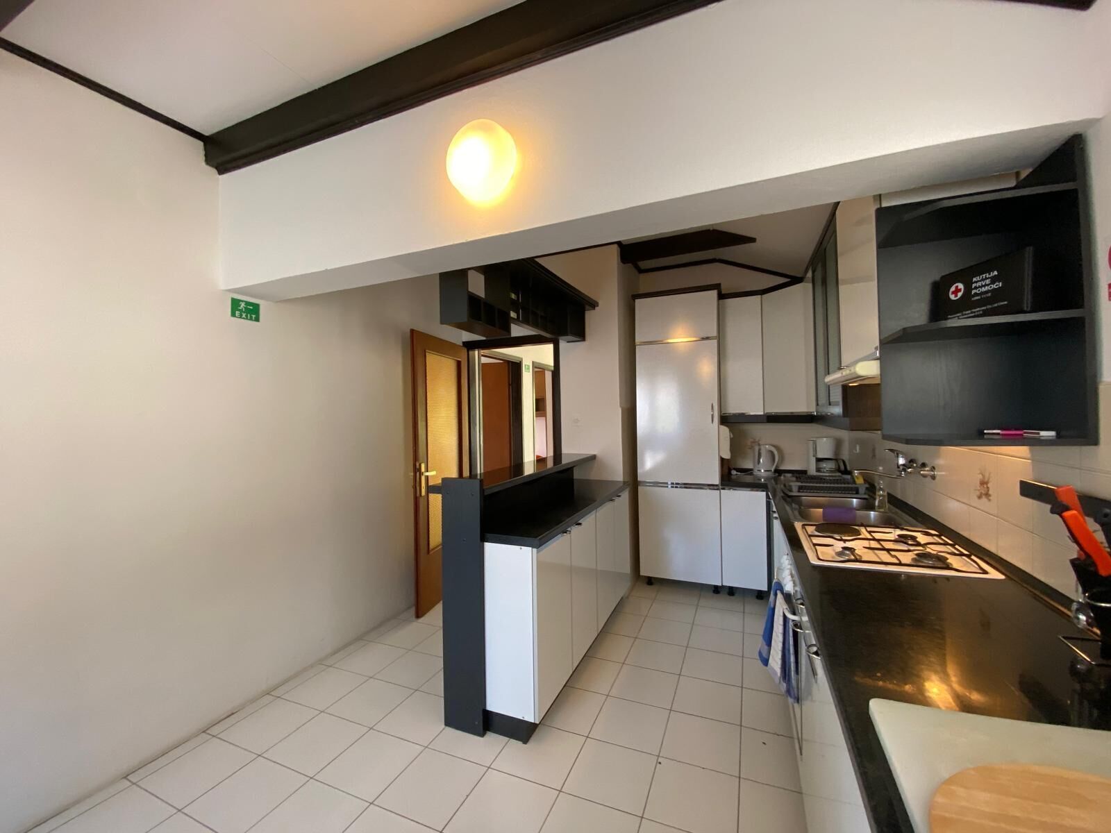 Apartamento (A1) | Cocina privada | Frigorífico, horno, placa de cocina y máquina de café espresso