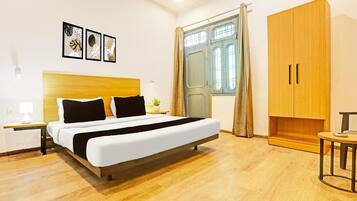 1 bedroom, desk, bed sheets