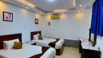 In-room safe, desk, laptop workspace, blackout drapes