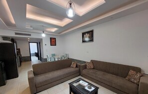 Studio Comfort - utsikt mot trädgården | Vardagsrum