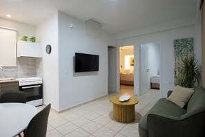 Apartamento superior, 2 habitaciones | Zona de estar