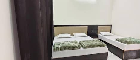 Deluxe Triple Room, Non Smoking, Private Bathroom | Desk, laptop workspace, free WiFi