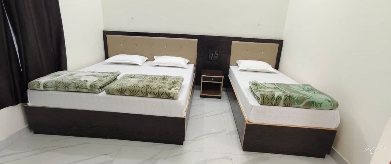Chambre Triple Deluxe, non-fumeur, salle de bains privée