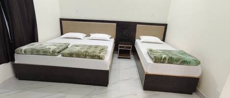 Deluxe Triple Room, Non Smoking, Private Bathroom | Desk, laptop workspace, free WiFi