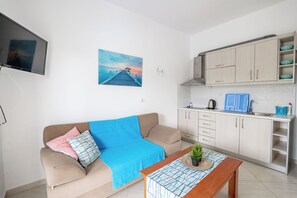 Apartamento standard | Área de estar