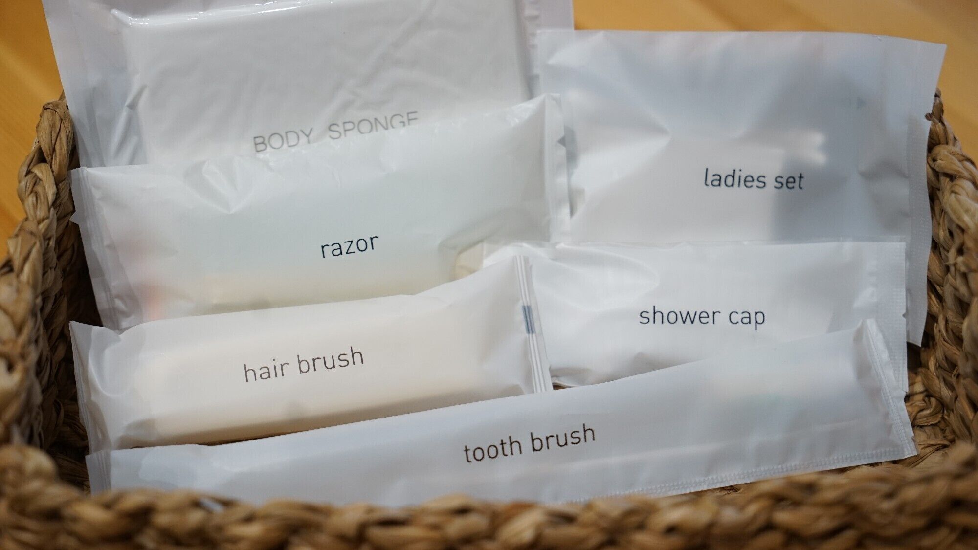 A basket containing various personal care items.