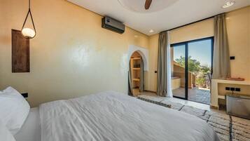 Premium bedding, free minibar items, in-room safe, laptop workspace
