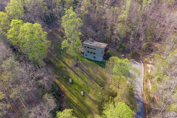 Situated on a large, manicured lot with no immediate neighbors, ensuring a peaceful stay.