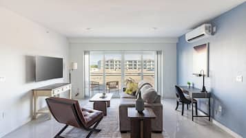 Apartment (2 Bedrooms) | Living area | 50-inch TV with digital channels