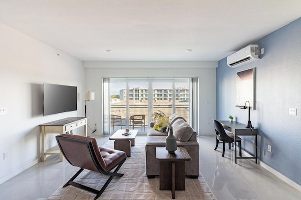 Apartment (2 Bedrooms) | Living area | 50-inch TV with digital channels