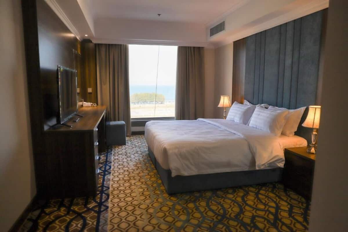 Chambre Junior avec lits jumeaux, balcon, vue mer | Draps en coton égyptien, literie de qualité supérieure